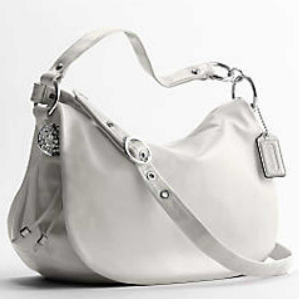 Gorgeous Coach White Pebbled Leather flap bag $458